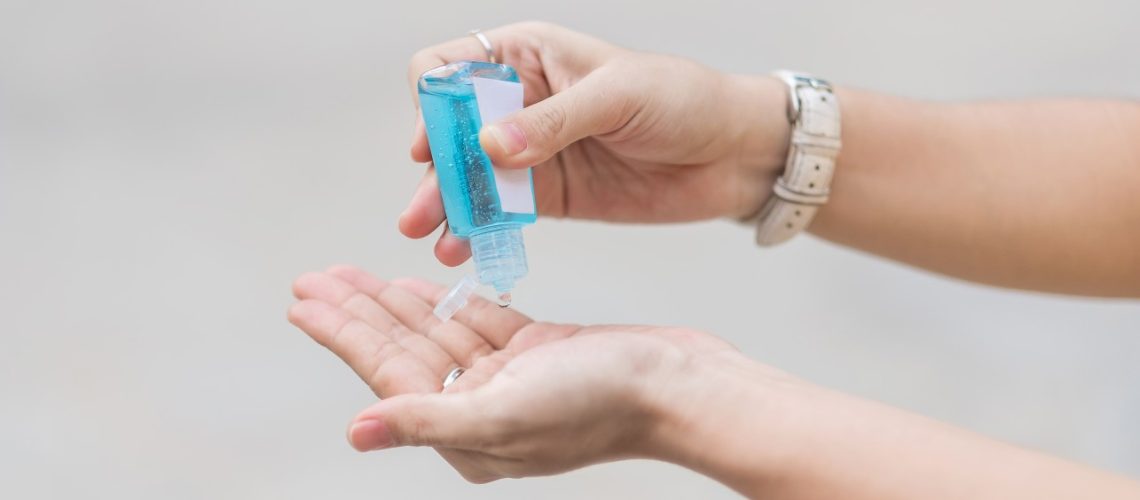 woman-hands-using-wash-hand-sanitizer-gel-dispenser-against-novel-coronavirus-or-corona-virus-disease_t20_KAYGbE